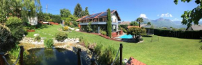 Gîte avec piscine chauffée & aires de jeux pour enfants